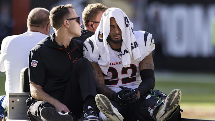 Oct 20, 2024; Cleveland, Ohio, USA; Cincinnati Bengals safety Geno Stone (22) rides the medical cart to the locker room following a leg injury during the fourth quarter against the Cleveland Browns at Huntington Bank Field. Mandatory Credit: Scott Galvin-Imagn Images