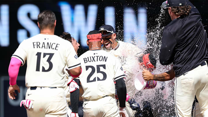 May 11, 2025; Minneapolis, Minnesota, USA; Minnesota Twins outfielder DaShawn Keirsey Jr. (21) celebrates his walk-off single against the San Francisco Giants during the tenth inning at Target Field.