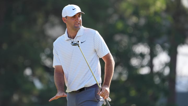 Jun 14, 2024; Pinehurst, North Carolina, USA; Scottie Scheffler reacts after a putt on the 13th hole during the second round of the U.S. Open golf tournament at Pinehurst No. 2. Mandatory Credit: John David Mercer-USA TODAY Sports Jun 14, 2024; Pinehurst, North Carolina, USA; Scottie Scheffler reacts after a putt on the 13th hole during the second round of the U.S. Open golf tournament at Pinehurst No. 2. Mandatory Credit: John David Mercer-USA TODAY Sports