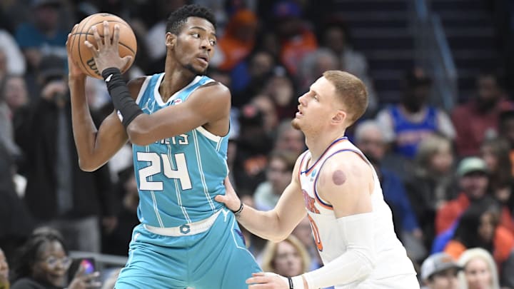 Jan 29, 2024; Charlotte, North Carolina, USA;  Charlotte Hornets forward Brandon Miller (24) looks