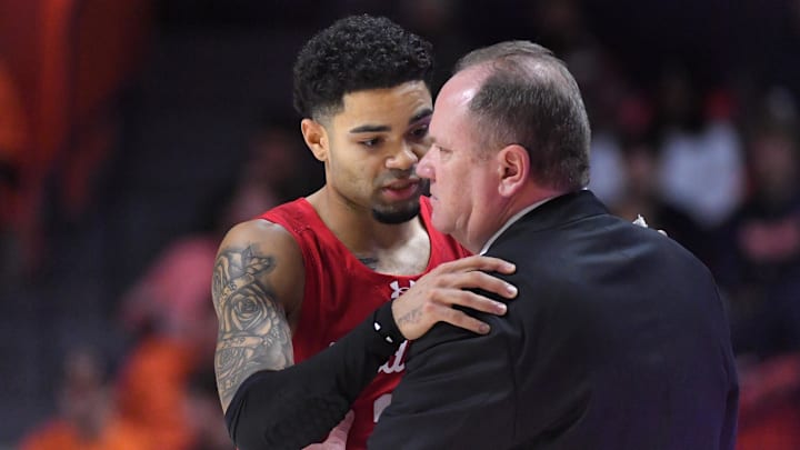 Feb 10, 2026; Champaign, Illinois, USA;  Wisconsin Badgers head coach Greg Gard and player Nick Boyd (2) talk during the second half against the Illinois Fighting Illini at State Farm Center. Mandatory Credit: Ron Johnson-Imagn Images