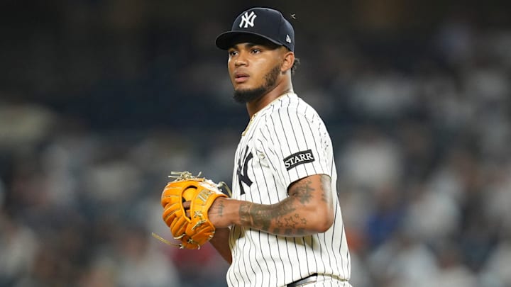 New York Yankees pitcher Camilo Doval (75) looks on while a bug flies by his head during a game against the Minnesota Twins at Yankee Stadium, Aug 13, 2025, Bronx, New York, USA.
