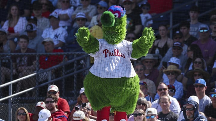 Mar 1, 2026; Clearwater, Florida, USA; Philadelphia Phillies mascot the Phanatic entertains fans against the New York Yankees in the third inning during spring training at BayCare Ballpark. Mandatory Credit: Nathan Ray Seebeck-Imagn Images Mar 1, 2026; Clearwater, Florida, USA; Philadelphia Phillies mascot the Phanatic entertains fans against the New York Yankees in the third inning during spring training at BayCare Ballpark. Mandatory Credit: Nathan Ray Seebeck-Imagn Images