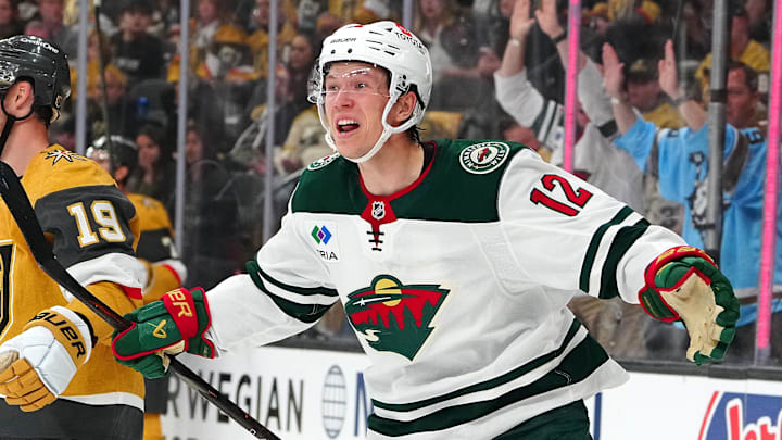 Apr 20, 2025; Las Vegas, Nevada, USA; Minnesota Wild left wing Matt Boldy (12) celebrates after scoring a goal against the Vegas Golden Knights during the first period of game one of the first round of the 2025 Stanley Cup Playoffs at T-Mobile Arena. Mandatory Credit: Stephen R. Sylvanie-Imagn Images