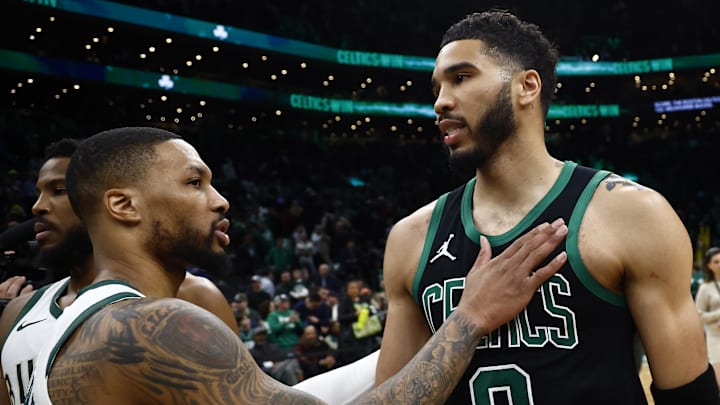 Mar 20, 2024; Boston, Massachusetts, USA; Boston Celtics forward Jayson Tatum (0) and Milwaukee Bucks guard Damian Lillard (0) talk after their game at TD Garden. Mandatory Credit: Winslow Townson-Imagn Images Mar 20, 2024; Boston, Massachusetts, USA; Boston Celtics forward Jayson Tatum (0) and Milwaukee Bucks guard Damian Lillard (0) talk after their game at TD Garden. Mandatory Credit: Winslow Townson-Imagn Images