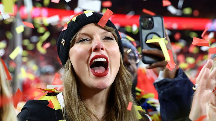 Taylor Swift cheers for Travis Kelce at a Kansas City Chiefs game. Taylor Swift cheers for Travis Kelce at a Kansas City Chiefs game.