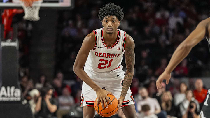 Feb 28, 2026; Athens, Georgia, USA; Georgia Bulldogs forward Jake Wilkins (21) handles the ball against the South Carolina Gamecocks during the first half at Stegeman Coliseum. Mandatory Credit: Dale Zanine-Imagn Images