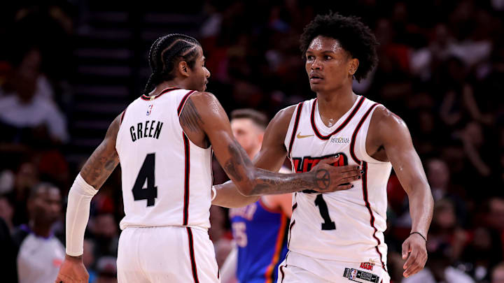 Apr 4, 2025; Houston, Texas, USA; Houston Rockets guard Amen Thompson (1) is congratulated by Houston Rockets guard Jalen Green (4) after a made basket against the Oklahoma City Thunder during the fourth quarter at Toyota Center. Mandatory Credit: Erik Williams-Imagn Images