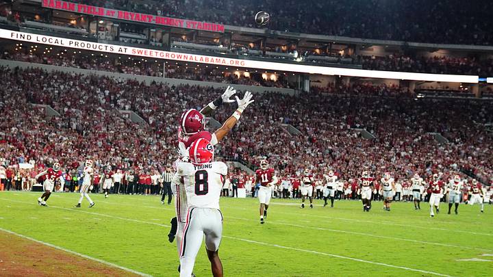 Sep 28, 2024; Tuscaloosa, Alabama, USA; Alabama Crimson Tide defensive back Zabien Brown (2) intercepts a pass intended for Georgia Bulldogs wide receiver Colbie Young (8) during the fourth quarter at Bryant-Denny Stadium. Mandatory Credit: John David Mercer-Imagn Images Sep 28, 2024; Tuscaloosa, Alabama, USA; Alabama Crimson Tide defensive back Zabien Brown (2) intercepts a pass intended for Georgia Bulldogs wide receiver Colbie Young (8) during the fourth quarter at Bryant-Denny Stadium. Mandatory Credit: John David Mercer-Imagn Images