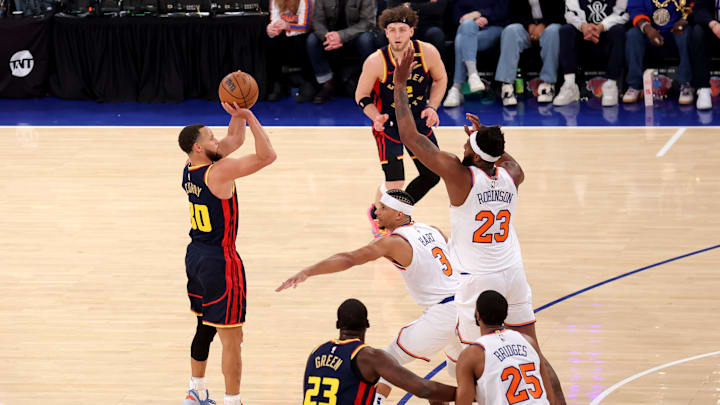 Mar 4, 2025; New York, New York, USA; Golden State Warriors guard Stephen Curry (30) shoots a three point shot against New York Knicks guard Josh Hart (3) and center Mitchell Robinson (23) during the first quarter at Madison Square Garden. Mandatory Credit: Brad Penner-Imagn Images Mar 4, 2025; New York, New York, USA; Golden State Warriors guard Stephen Curry (30) shoots a three point shot against New York Knicks guard Josh Hart (3) and center Mitchell Robinson (23) during the first quarter at Madison Square Garden. Mandatory Credit: Brad Penner-Imagn Images