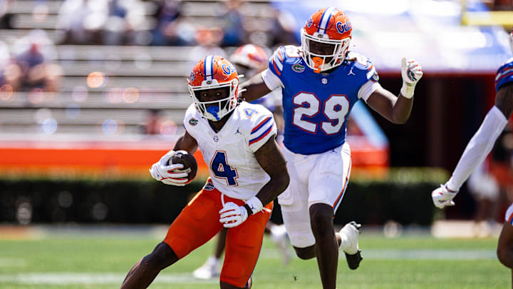 Florida Gators wide receiver TJ Abrams (4) runs with the ball during the second half at the Orange and Blue spring football game at Steve Spurrier Field at Ben Hill Griffin Stadium in Gainesville, FL on Saturday, April 13, 2024. [Matt Pendleton/Gainesville Sun]