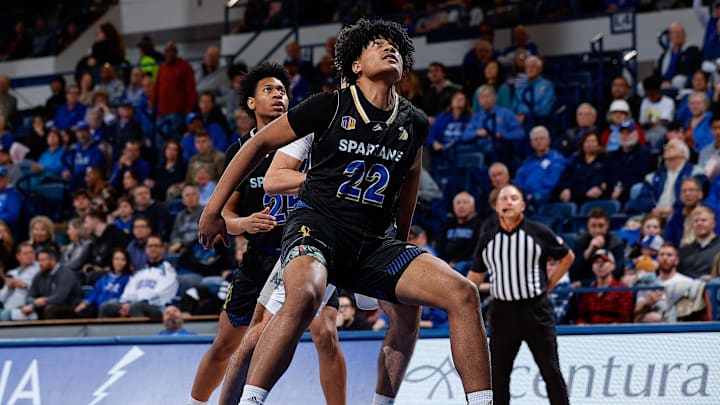 Mar 4, 2023; Colorado Springs, Colorado, USA; San Jose State Spartans forward Robert Vaihola (22) and guard Ryen Perry (25) box out Air Force Falcons forward Beau Becker (14) in the second half at Clune Arena.
