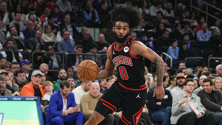 Feb 20, 2025; New York, New York, USA; Chicago Bulls point guard Coby White (0) dribbles the ball towards the basket during the first half at Madison Square Garden. Mandatory Credit: Gregory Fisher-Imagn Images