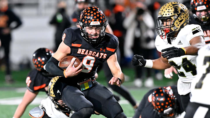 Aledo quarterback Hauss Hejny scrambles with the ball against Abilene High during Friday   s Region I-5A Div. I final in Stephenville Dec. 1, 2023. Final score was 56-21, Aledo.