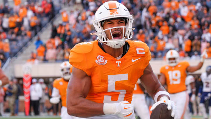Tennessee wide receiver Bru McCoy (5) celebrates after scoring a touchdown during a NCAA football game between Tennessee and UTEP in Neyland Stadium on Saturday, November 23, 2024.