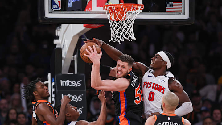 Nov 11, 2022; New York, New York, USA; New York Knicks center Isaiah Hartenstein (55) rebounds against Detroit Pistons center Jalen Duren (0) during the second half at Madison Square Garden. Mandatory Credit: Vincent Carchietta-Imagn Images