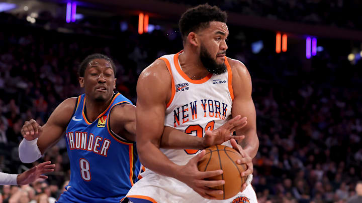 Jan 10, 2025; New York, New York, USA; New York Knicks center Karl-Anthony Towns (32) controls the ball against Oklahoma City Thunder forward Jalen Williams (8) during the third quarter at Madison Square Garden. Mandatory Credit: Brad Penner-Imagn Images Jan 10, 2025; New York, New York, USA; New York Knicks center Karl-Anthony Towns (32) controls the ball against Oklahoma City Thunder forward Jalen Williams (8) during the third quarter at Madison Square Garden. Mandatory Credit: Brad Penner-Imagn Images