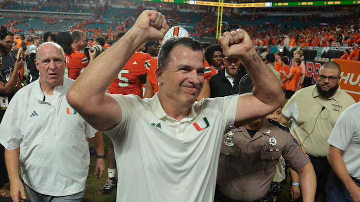 Aug 31, 2025; Miami Gardens, Florida, USA; Miami Hurricanes head coach Mario Cristobal reacts after defeating the Notre Dame Fighting Irish at Hard Rock Stadium. Mandatory Credit: Sam Navarro-Imagn Images