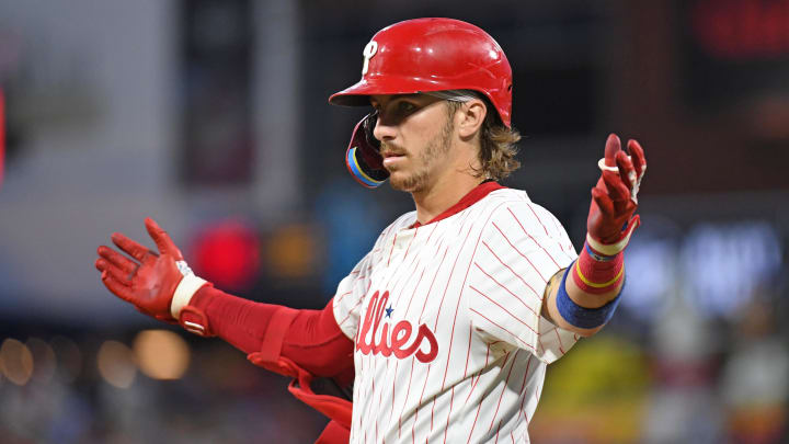 Jul 10, 2024; Philadelphia, Pennsylvania, USA;  Philadelphia Phillies second base Bryson Stott (5) reacts after hitting an RBI single during the fifth inning against the Los Angeles Dodgers at Citizens Bank Park. Mandatory Credit: Eric Hartline-USA TODAY Sports