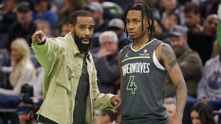 Minnesota Timberwolves guard Rob Dillingham listens to Mike Conley during a timeout in the fourth quarter against the Houston Rockets at Target Center in Minneapolis on Nov. 26, 2024. Minnesota Timberwolves guard Rob Dillingham listens to Mike Conley during a timeout in the fourth quarter against the Houston Rockets at Target Center in Minneapolis on Nov. 26, 2024.