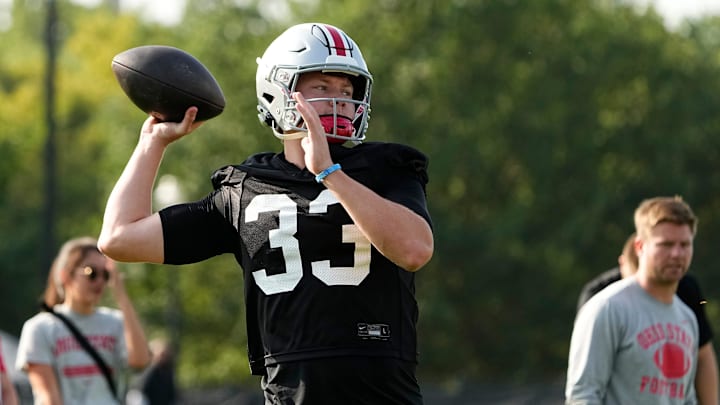 Aug 1, 2024; Columbus, OH, USA; Ohio State Buckeyes quarterback Devin Brown (33) throws during football camp at the Woody Hayes Athletic Complex.