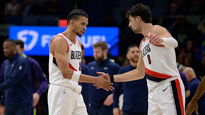 Jan 8, 2025; New Orleans, Louisiana, USA: Portland Trail Blazers forward Toumani Camara (33) celebrates with forward Deni Avdija (8) during the first half against the New Orleans Pelicans at Smoothie King Center. Mandatory Credit: Matthew Hinton-Imagn Images