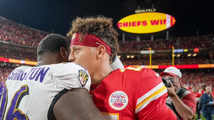 Sep 5, 2024; Kansas City, Missouri, USA; Kansas City Chiefs quarterback Patrick Mahomes (15) embraces Baltimore Ravens defensive tackle Broderick Washington (96) on field after the win over the game at GEHA Field at Arrowhead Stadium. Mandatory Credit: Denny Medley-Imagn Images