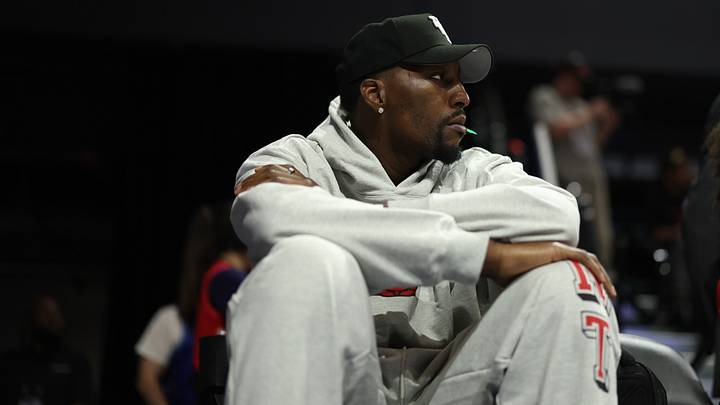 Miami Heat forward Bam Adebayo watches courtside (Mandatory Credit: Geoff Burke-Imagn Images)