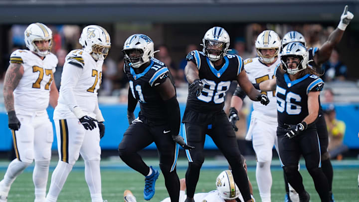 Nov 9, 2025; Charlotte, North Carolina, USA; Carolina Panthers linebacker Nic Scourton (11) celebrates a sack during the fourth quarter against the New Orleans Saints at Bank of America Stadium. Mandatory Credit: Jim Dedmon-Imagn Images Nov 9, 2025; Charlotte, North Carolina, USA; Carolina Panthers linebacker Nic Scourton (11) celebrates a sack during the fourth quarter against the New Orleans Saints at Bank of America Stadium. Mandatory Credit: Jim Dedmon-Imagn Images