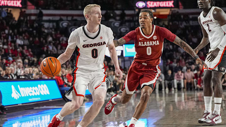 Mar 3, 2026; Athens, Georgia, USA; Georgia Bulldogs guard Blue Cain (0) dribbles against Alabama Crimson Tide guard Labaron Philon (0) guard Jeremiah Wilkinson (5) loses the ball to Alabama Crimson Tide forward Aiden Sherrell (22) at Stegeman Coliseum. Mandatory Credit: Dale Zanine-Imagn Images