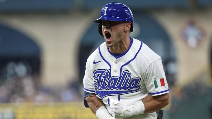 Mar 8, 2026; Houston, TX, United States;  Italy left fielder Dante Nori (16) reacts after hitting a RBI single against the Great Britain in the fourth inning at Daikin Park. Mandatory Credit: Thomas Shea-Imagn Images
