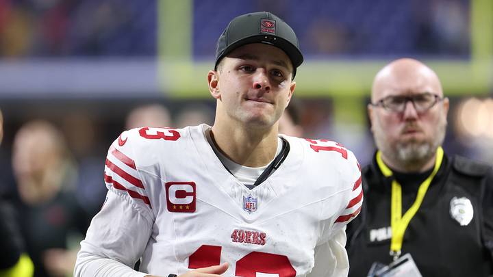Dec 22, 2025; Indianapolis, Indiana, USA; San Francisco 49ers quarterback Brock Purdy (13) leaves the field after the game against the Indianapolis Colts at Lucas Oil Stadium. Mandatory Credit: Trevor Ruszkowski-Imagn Images