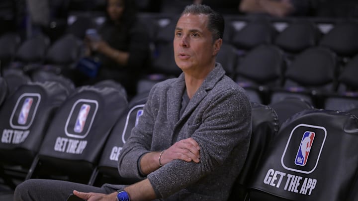 Mar 22, 2023; Los Angeles, California, USA;  Rob Pelinka, Vice President of Operations watches players warm up prior to the game against the Phoenix Suns at Crypto.com Arena. Mandatory Credit: Jayne Kamin-Oncea-Imagn Images