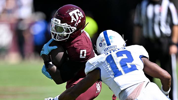 Sep 19, 2026; College Station, Texas, USA; Texas A&M Aggies running back KJ Edwards (0) runs the ball as Kentucky Wildcats defensive back Hasaan Sykes (12) defends at Kyle Field. Mandatory Credit: Maria Lysaker-Imagn Images Sep 19, 2026; College Station, Texas, USA; Texas A&M Aggies running back KJ Edwards (0) runs the ball as Kentucky Wildcats defensive back Hasaan Sykes (12) defends at Kyle Field. Mandatory Credit: Maria Lysaker-Imagn Images