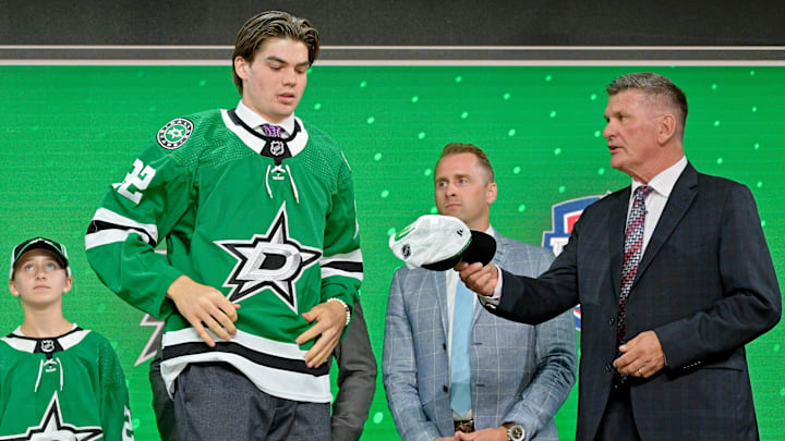 Jul 7, 2022; Montreal, Quebec, CANADA; Lian Bichsel after being selected as the number eighteen overall pick to the Dallas Stars in the first round of the 2022 NHL Draft at Bell Centre. Mandatory Credit: Eric Bolte-Imagn Images