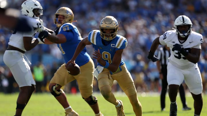 UCLA Bruins quarterback Nico Iamaleava (9) runs for a touchdown during the fourth quarter against the Penn State Nittany Lions at Rose Bowl. UCLA Bruins quarterback Nico Iamaleava (9) runs for a touchdown during the fourth quarter against the Penn State Nittany Lions at Rose Bowl.