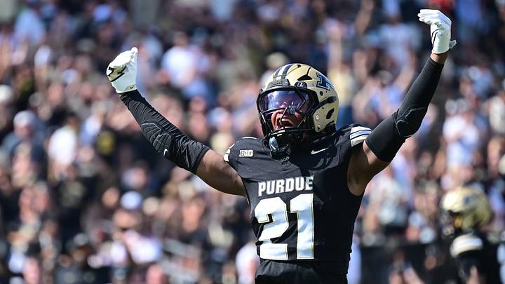 Sep 12, 2026; West Lafayette, Indiana, USA;  Purdue Boilermakers defensive back Justin Denson Jr. (21) motions to the crowd during the second overtime period against the Wake Forest Demon Deacons at Ross-Ade Stadium.  Mandatory Credit: Marc Lebryk-Imagn Images