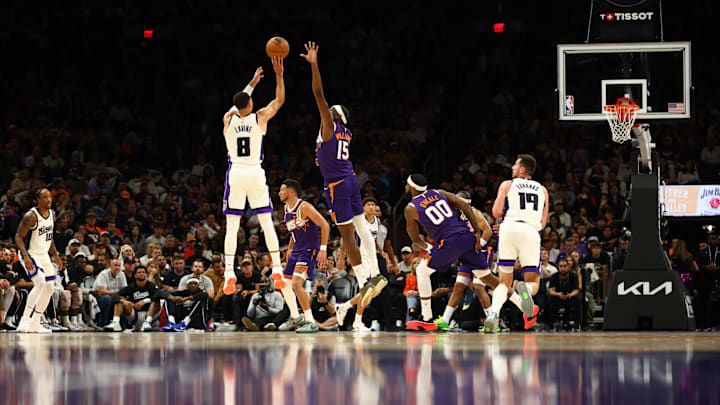 Oct 22, 2025; Phoenix, Arizona, USA: Sacramento Kings guard Zach LaVine (8) shoots the ball against Phoenix Suns center Mark Williams (15) at the Mortgage Matchup Center. Mandatory Credit: Mark J. Rebilas-Imagn Images Oct 22, 2025; Phoenix, Arizona, USA: Sacramento Kings guard Zach LaVine (8) shoots the ball against Phoenix Suns center Mark Williams (15) at the Mortgage Matchup Center. Mandatory Credit: Mark J. Rebilas-Imagn Images