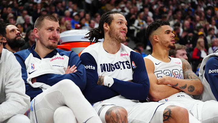 Dec 23, 2024; Denver, Colorado, USA; Denver Nuggets center Nikola Jokic (15) and forward Aaron Gordon (32) and forward Michael Porter Jr. (1) on the bench in the fourth quarter against the Phoenix Suns at Ball Arena. Mandatory Credit: Ron Chenoy-Imagn Images Dec 23, 2024; Denver, Colorado, USA; Denver Nuggets center Nikola Jokic (15) and forward Aaron Gordon (32) and forward Michael Porter Jr. (1) on the bench in the fourth quarter against the Phoenix Suns at Ball Arena. Mandatory Credit: Ron Chenoy-Imagn Images