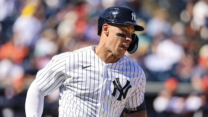 Feb 21, 2026; Tampa, Florida, USA; New York Yankees outfielder Aaron Judge (99) hits a home run against the Detroit Tigers during the third inning in a Spring Training game at George M. Steinbrenner Field. Mandatory Credit: Morgan Tencza-Imagn Images