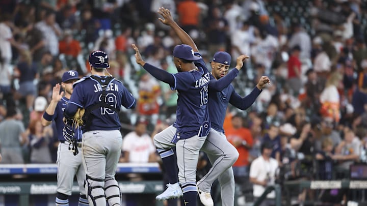 May 31, 2025; Houston, Texas, USA; Tampa Bay Rays designated hitter Junior Caminero (13) celebrates with teammates after the game against the Houston Astros at Daikin Park.