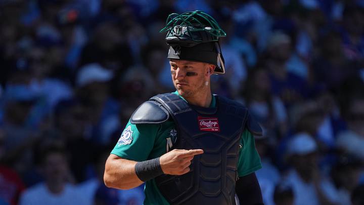 Mar 12, 2026; Mesa, Arizona, USA; Seattle Mariners catcher Andrew Knizner (25) calls out the play against the Chicago Cubs in the third inning at Sloan Park. Mandatory Credit: Rick Scuteri-Imagn Images