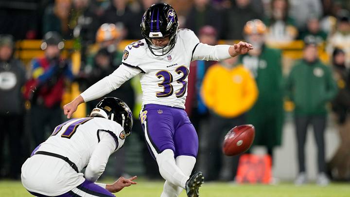 Dec 27, 2025; Green Bay, Wisconsin, USA; Baltimore Ravens place kicker Tyler Loop (33) makes a field goal during the second quarter against the Green Bay Packers at Lambeau Field. Mandatory Credit: Jeff Hanisch-Imagn Images