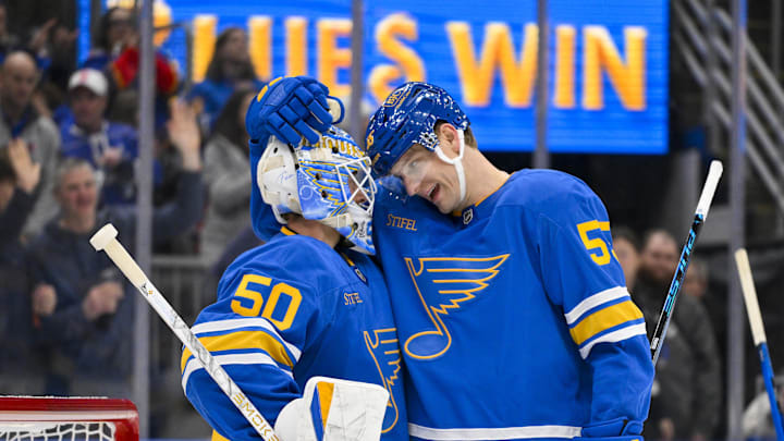 Jan 3, 2026; St. Louis, Missouri, USA; St. Louis Blues goaltender Jordan Binnington (50) celebrates with defenseman Colton Parayko (55) after recording a shutout in a victory over the Montreal Canadiens at Enterprise Center. Mandatory Credit: Jeff Curry-Imagn Images