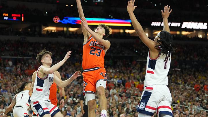 Apr 4, 2026; Indianapolis, IN, USA; Illinois Fighting Illini guard Keaton Wagler (23) shoots against the Connecticut Huskies in the second half during a semifinal of the Final Four of the men's 2026 NCAA Tournament at Lucas Oil Stadium. Mandatory Credit: Robert Deutsch-Imagn Images Apr 4, 2026; Indianapolis, IN, USA; Illinois Fighting Illini guard Keaton Wagler (23) shoots against the Connecticut Huskies in the second half during a semifinal of the Final Four of the men's 2026 NCAA Tournament at Lucas Oil Stadium. Mandatory Credit: Robert Deutsch-Imagn Images