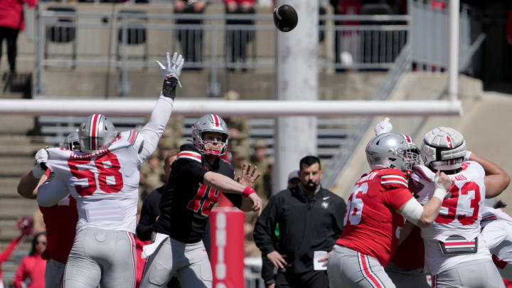 April 13, 2024; Columbus, Ohio, USA; Ohio State Buckeyes quarterback Will Howard (18) throws a pass while playing for the scarlet team during the first half of the LifeSports spring football game at Ohio Stadium on Saturday.