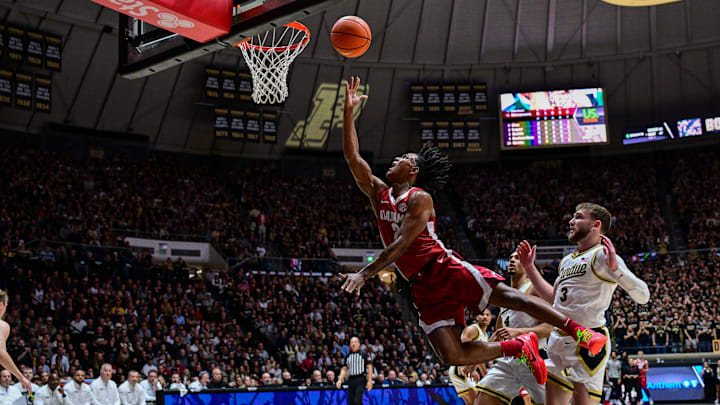 Nov 15, 2024; West Lafayette, Indiana, USA; Alabama Crimson Tide guard Aden Holloway (2) shoots the ball in front of Purdue Boilermakers guard Braden Smith (3) during the first half at Mackey Arena. Mandatory Credit: Marc Lebryk-Imagn Images Nov 15, 2024; West Lafayette, Indiana, USA; Alabama Crimson Tide guard Aden Holloway (2) shoots the ball in front of Purdue Boilermakers guard Braden Smith (3) during the first half at Mackey Arena. Mandatory Credit: Marc Lebryk-Imagn Images