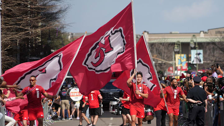 Feb 8, 2025; New Orleans, LA, USA; Kansas Chiefs flags during the Super Bowl LIX  Host Committee Parade. Mandatory Credit: Kirby Lee-Imagn Images