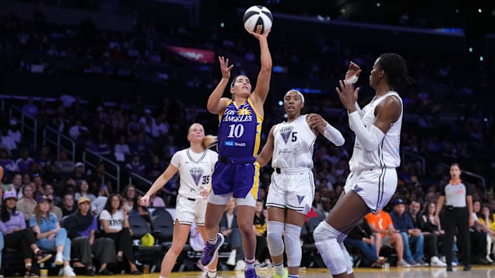Jun 9, 2025; Los Angeles, California, USA; LA Sparks guard Kelsey Plum (10) shoots the ball against Golden State Valkyries guard Julie Vanloo (35), forward Kayla Thornton (5) and center Temi Fagbenle (14) in the first half at Crypto.com Arena. Mandatory Credit: Kirby Lee-Imagn Images