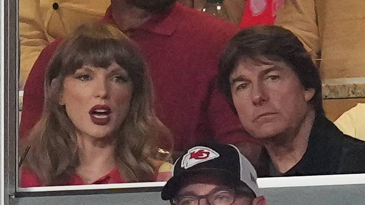 Taylor Swift and Tom Cruise sit at the Kansas City Chiefs game at GEHA Field at Arrowhead Stadium. 
